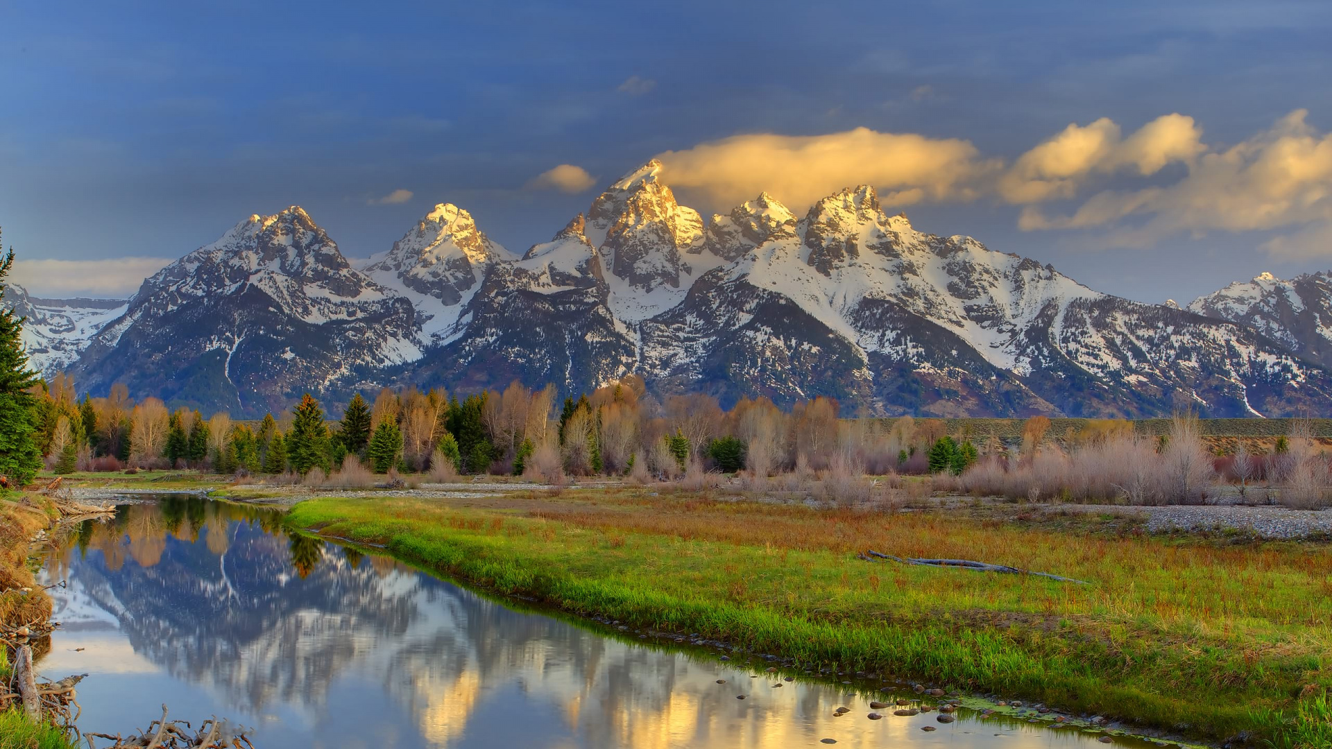 Green Grass Field Near Lake and Snow Covered Mountain During Daytime. Wallpaper in 1920x1080 Resolution