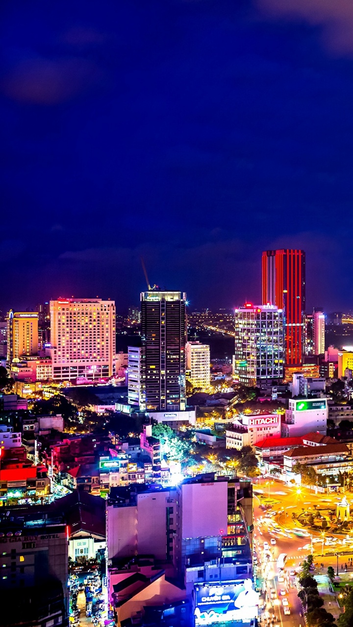City Skyline During Night Time. Wallpaper in 720x1280 Resolution