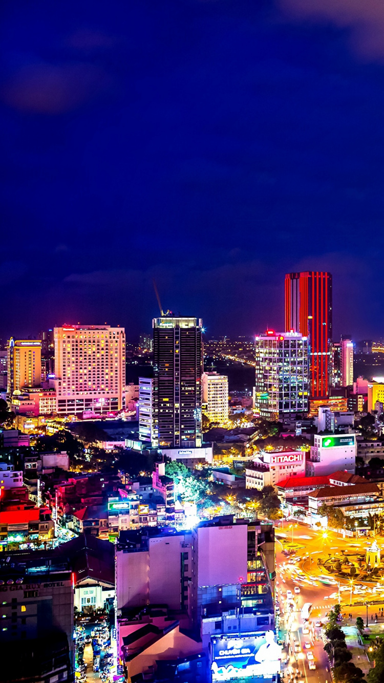 City Skyline During Night Time. Wallpaper in 750x1334 Resolution