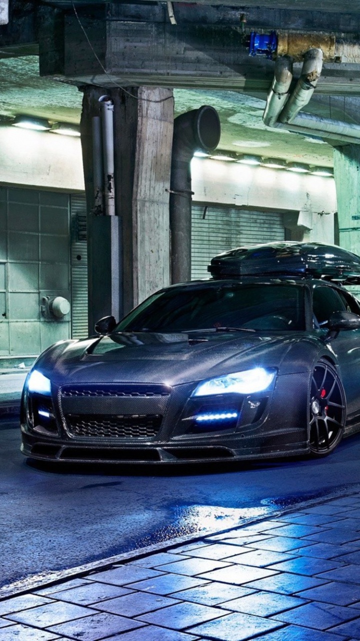 Black Porsche 911 Parked in Building. Wallpaper in 720x1280 Resolution