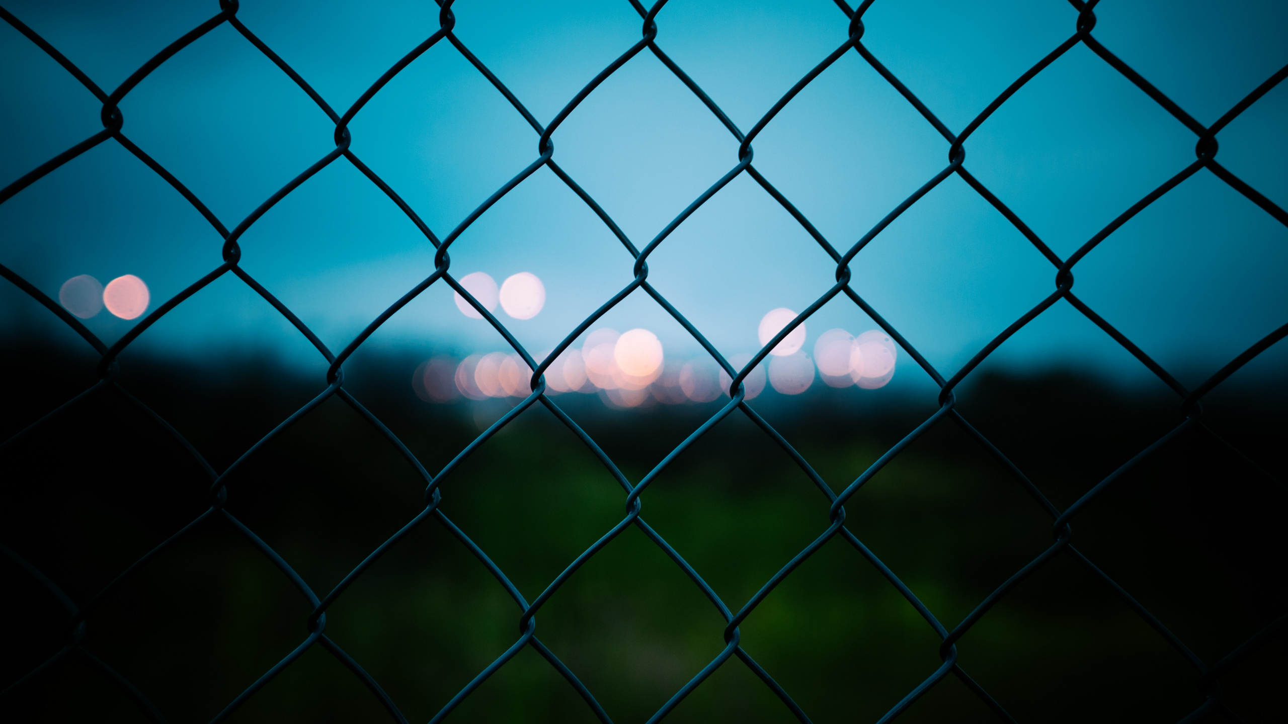 Black Metal Fence With Lights. Wallpaper in 2560x1440 Resolution