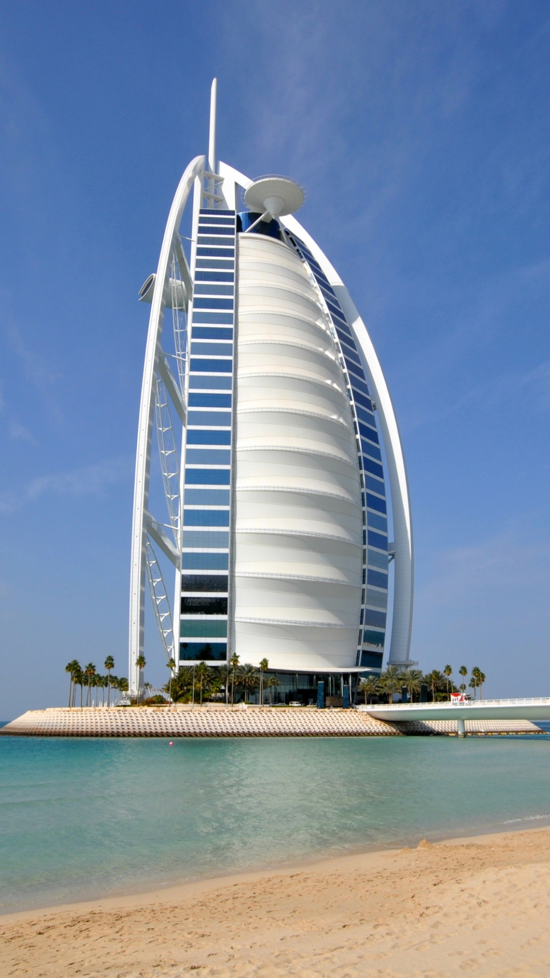 White and Blue Glass Building Near Sea During Daytime. Wallpaper in 1080x1920 Resolution