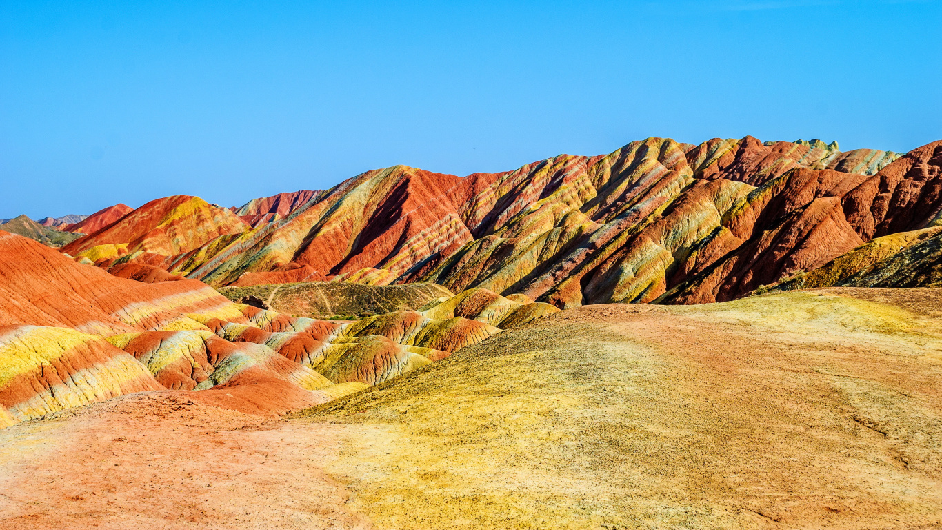 Brown and Gray Rock Formation Under Blue Sky During Daytime. Wallpaper in 1366x768 Resolution