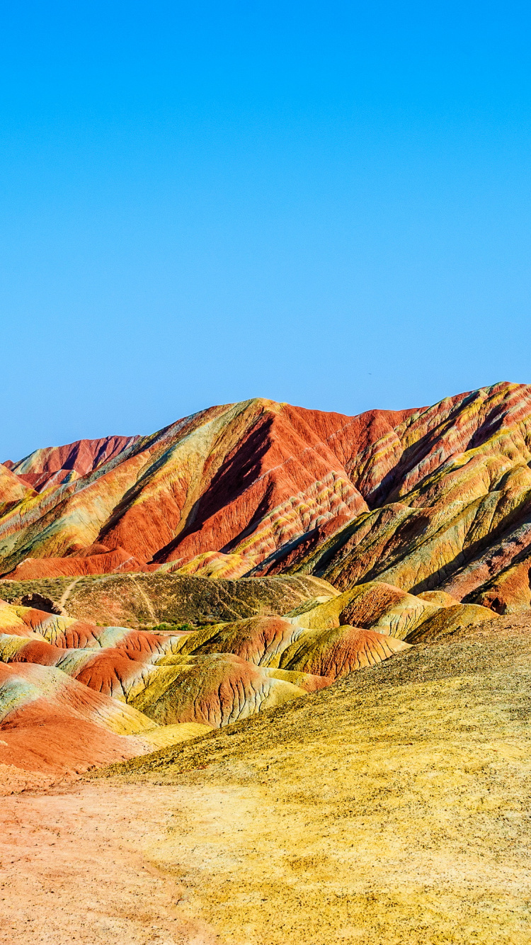 Brown and Gray Rock Formation Under Blue Sky During Daytime. Wallpaper in 750x1334 Resolution