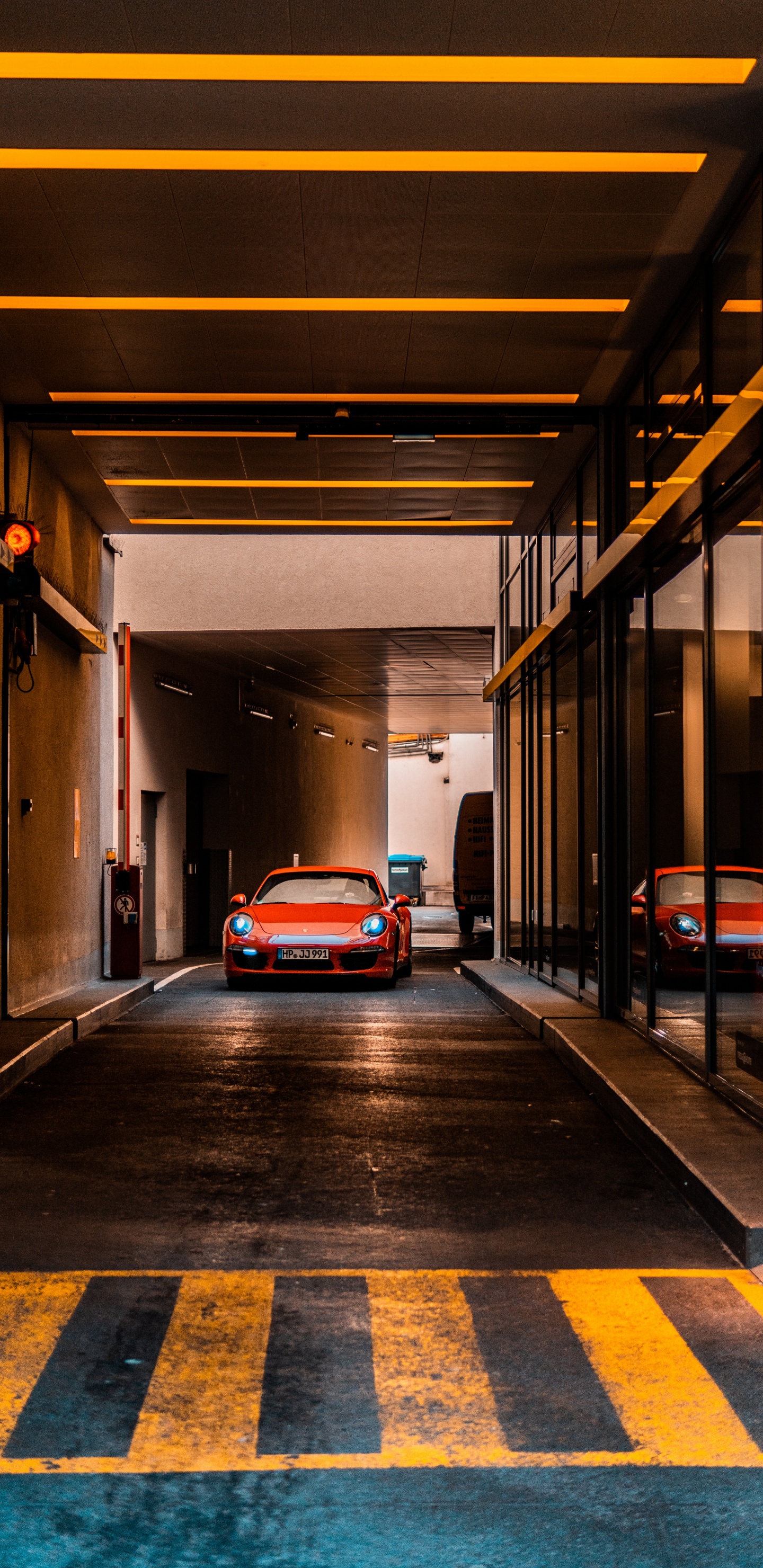 Red Car Parked on Tunnel. Wallpaper in 1440x2960 Resolution