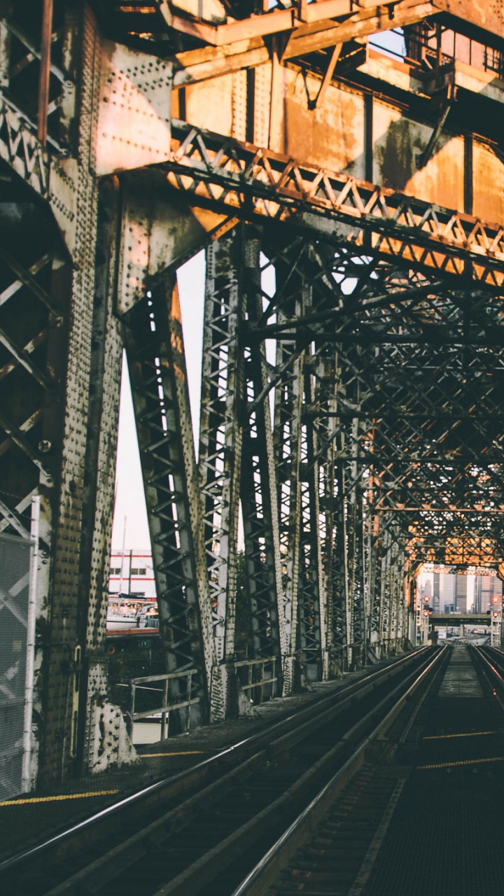 Black Metal Train Rail During Daytime. Wallpaper in 720x1280 Resolution