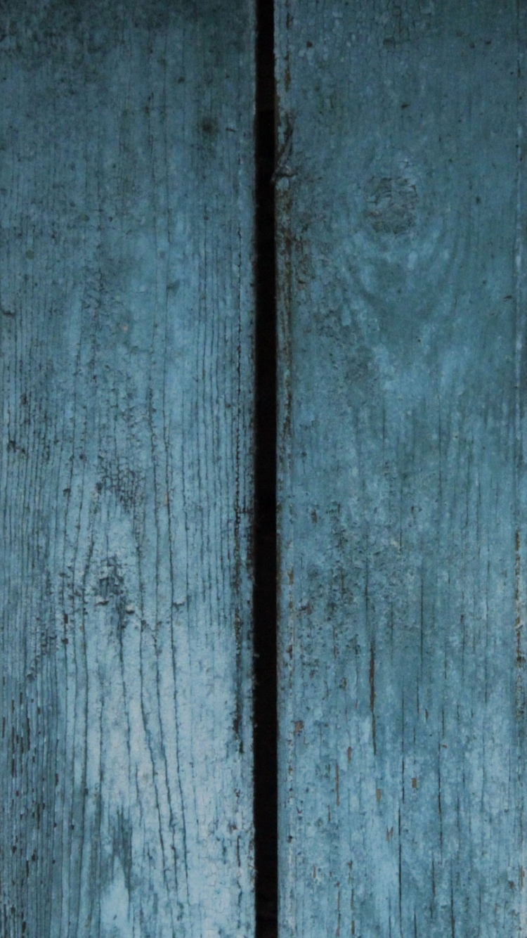 Blaues Holzbrett in Nahaufnahme. Wallpaper in 750x1334 Resolution