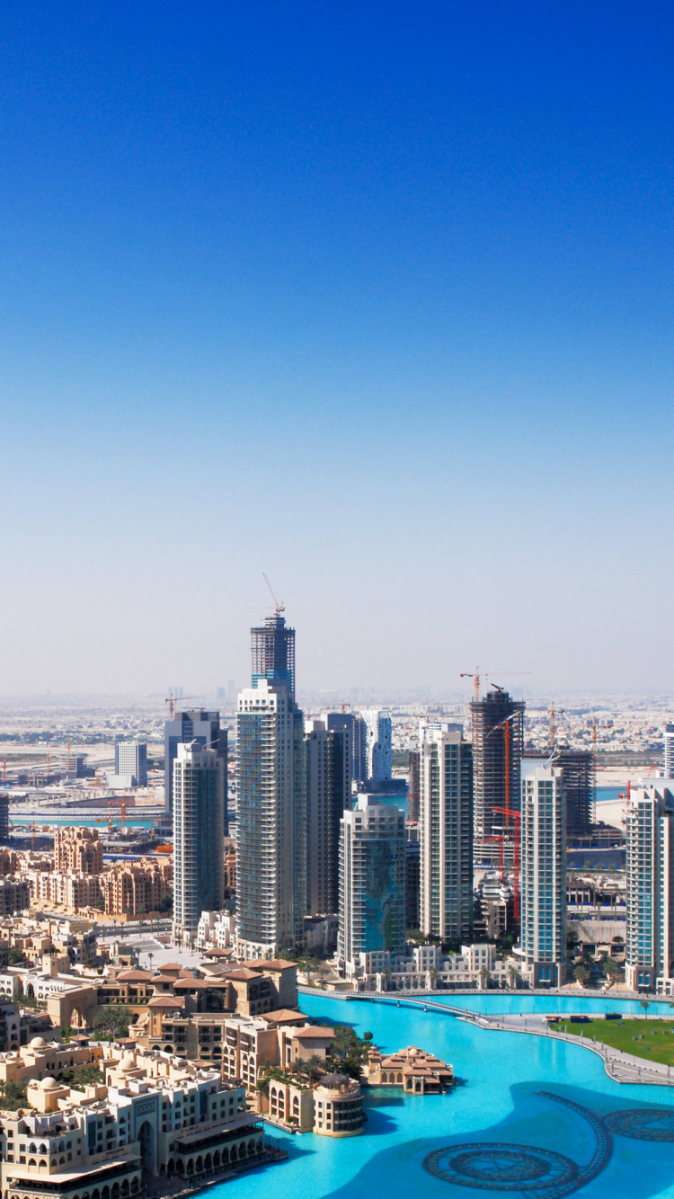 City Skyline During Night Time. Wallpaper in 750x1334 Resolution