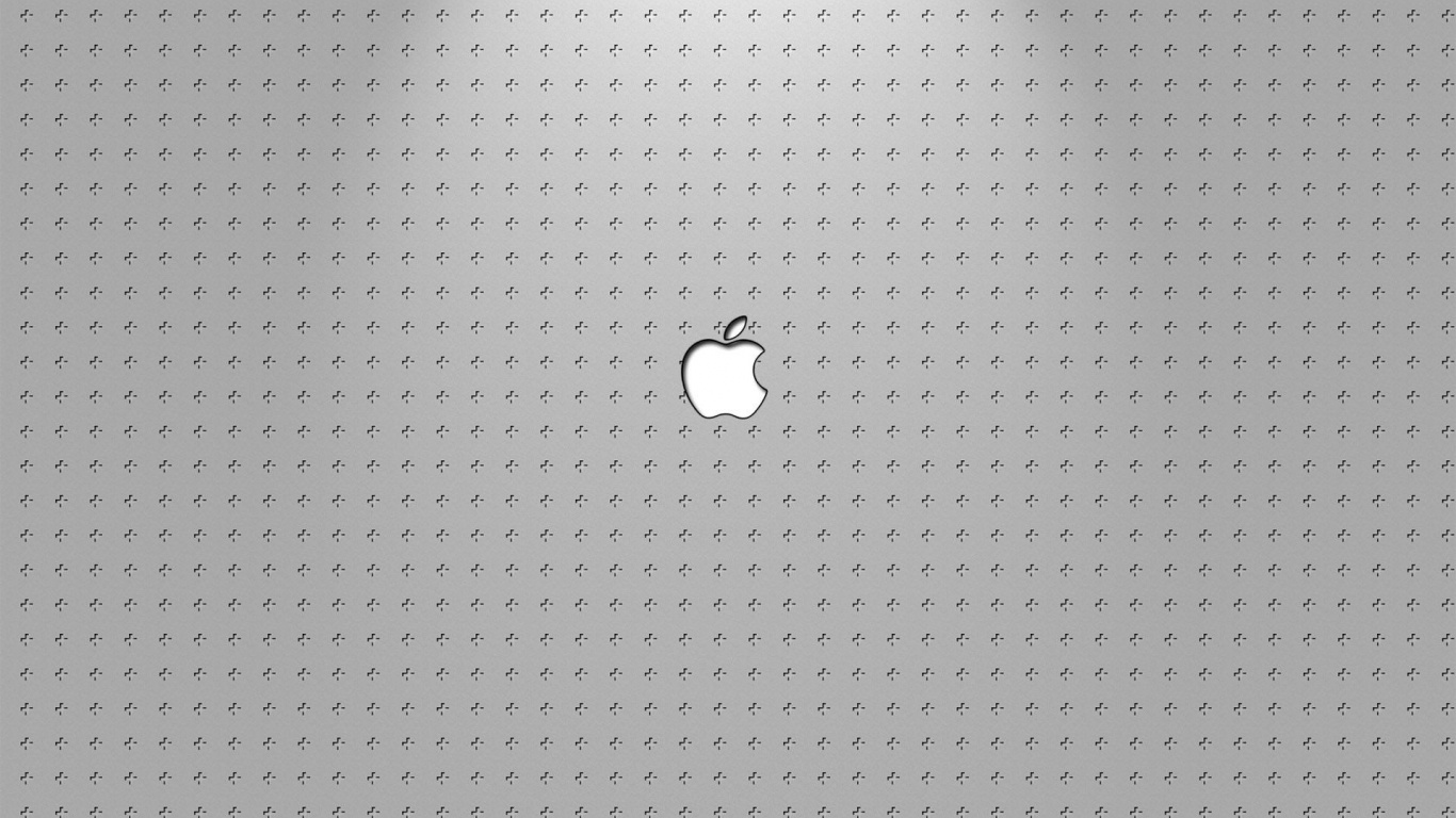 Silver Macbook on Black and White Polka Dot Textile. Wallpaper in 1366x768 Resolution