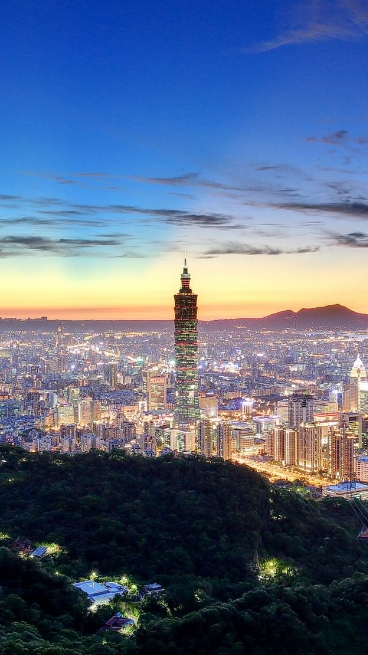 City Skyline Under Blue Sky During Sunset. Wallpaper in 720x1280 Resolution