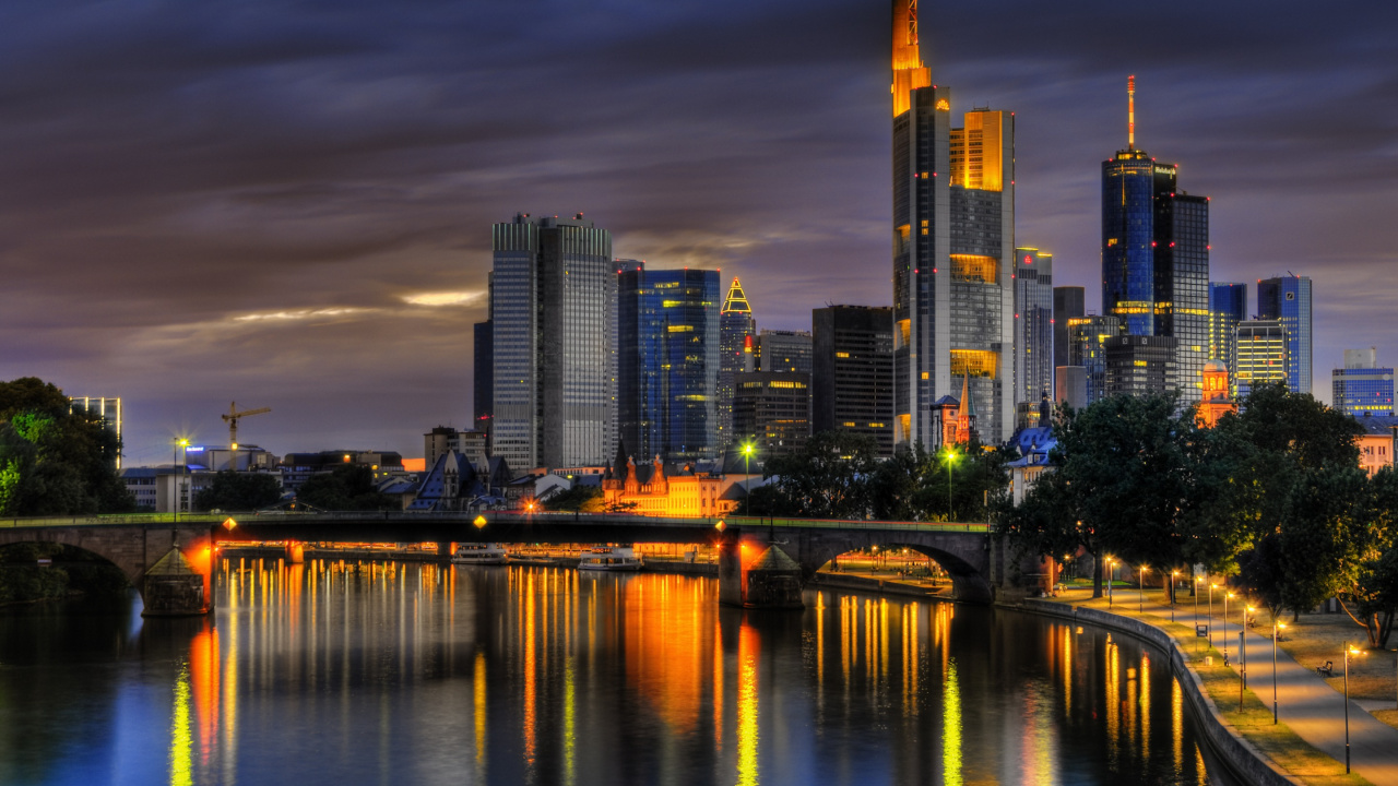 City Skyline Across Body of Water During Night Time. Wallpaper in 1280x720 Resolution