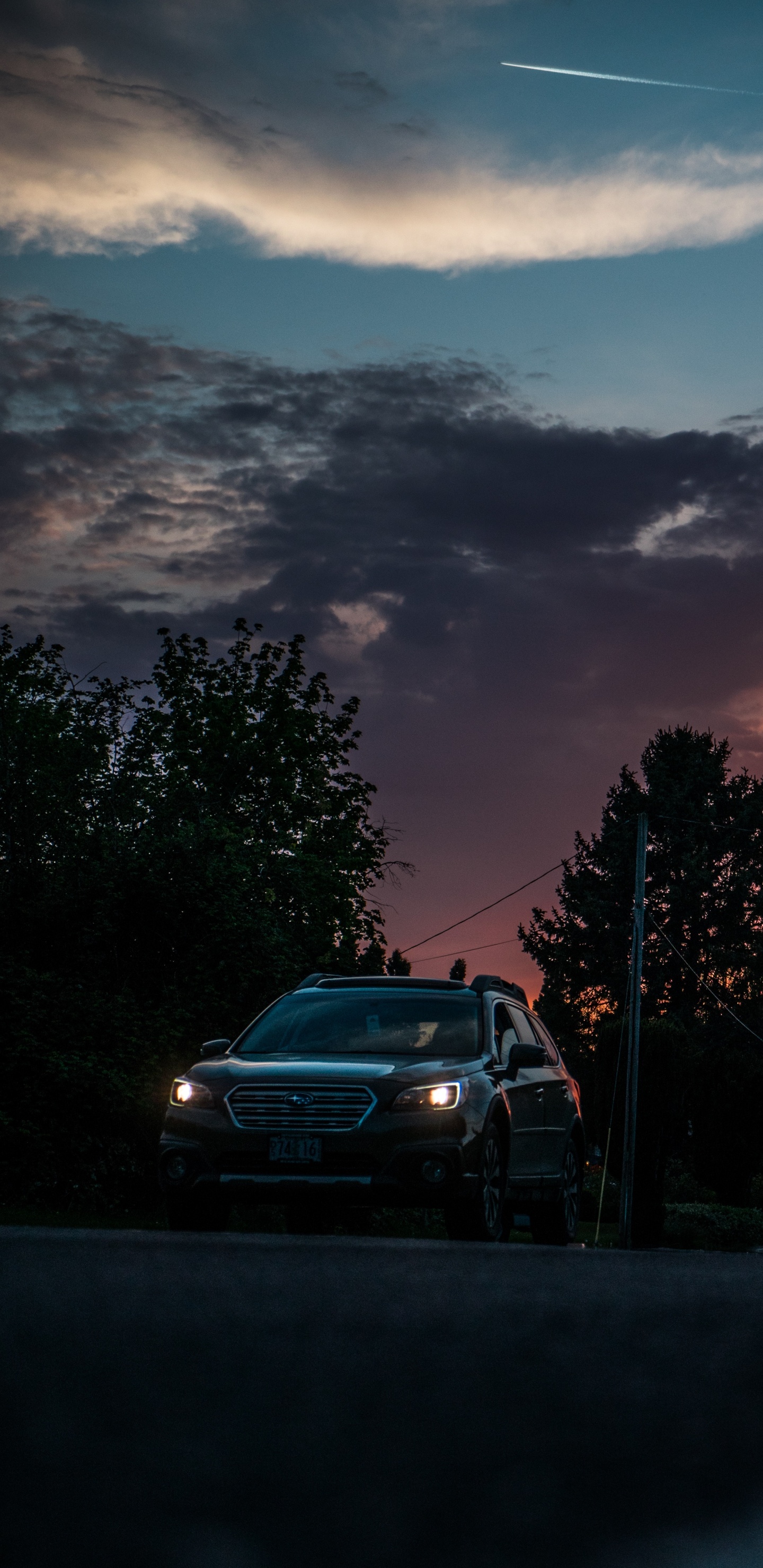 Gray Car on Road Near Trees During Sunset. Wallpaper in 1440x2960 Resolution