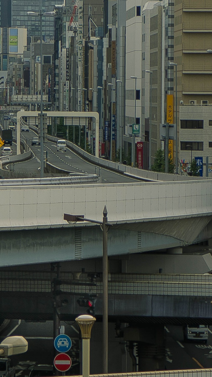 Cars on Road in City During Daytime. Wallpaper in 720x1280 Resolution