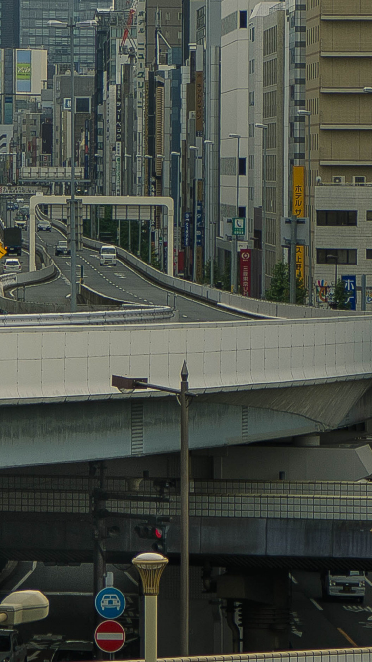 Cars on Road in City During Daytime. Wallpaper in 750x1334 Resolution