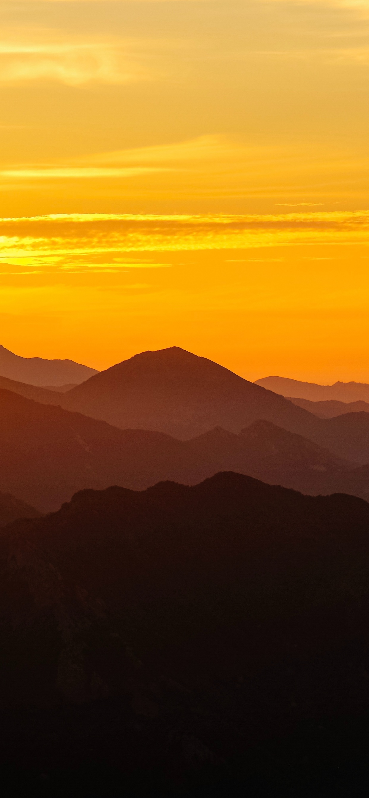 Silhouette of Mountains During Sunset. Wallpaper in 1242x2688 Resolution