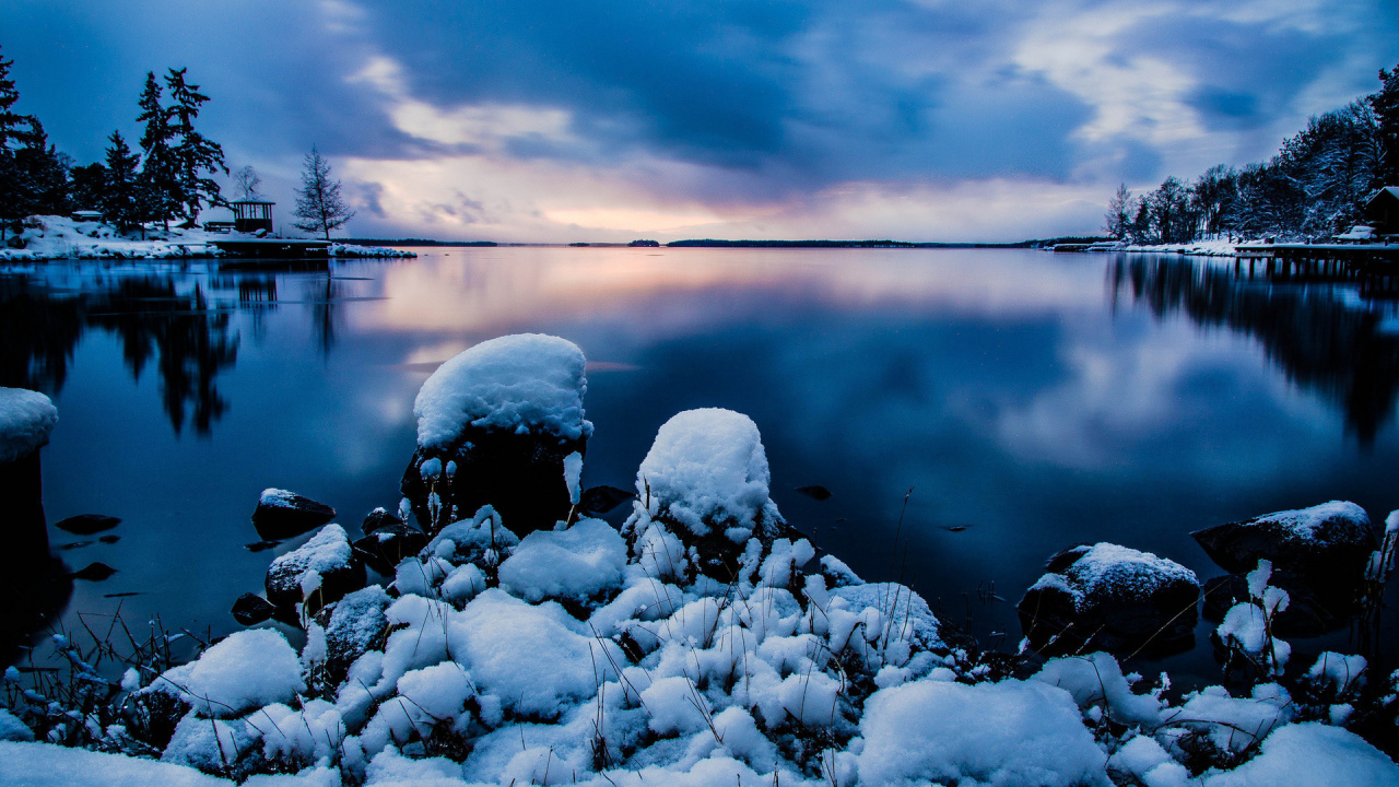 Gray and White Rocks on Body of Water Under Cloudy Sky. Wallpaper in 1280x720 Resolution