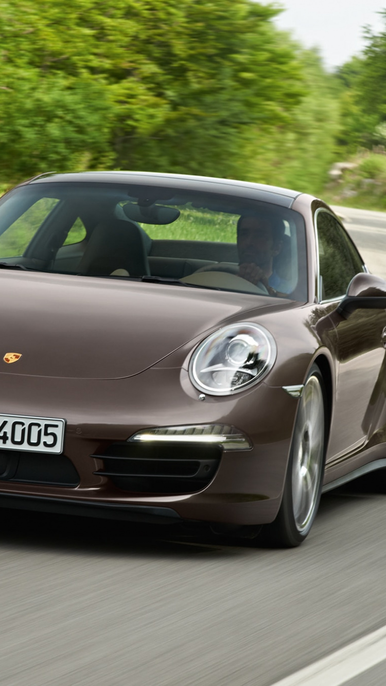 Black Porsche 911 on Road During Daytime. Wallpaper in 750x1334 Resolution