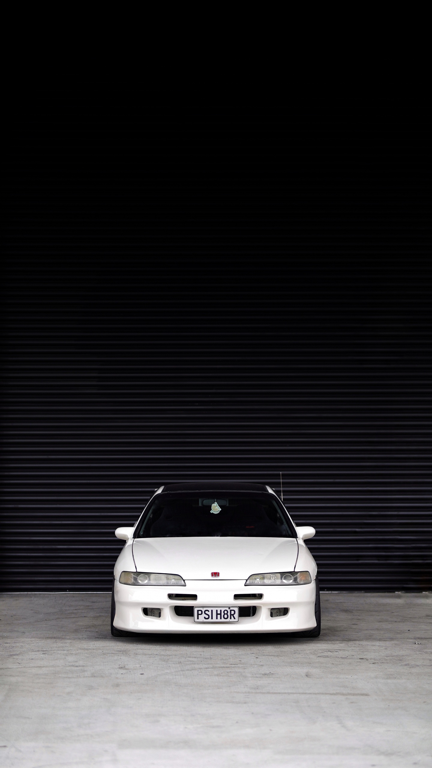 White Car in a White Room. Wallpaper in 1440x2560 Resolution