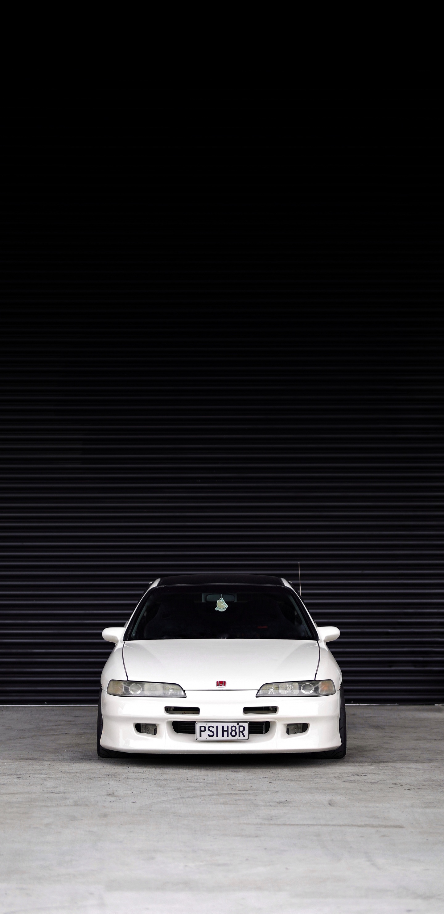 White Car in a White Room. Wallpaper in 1440x2960 Resolution