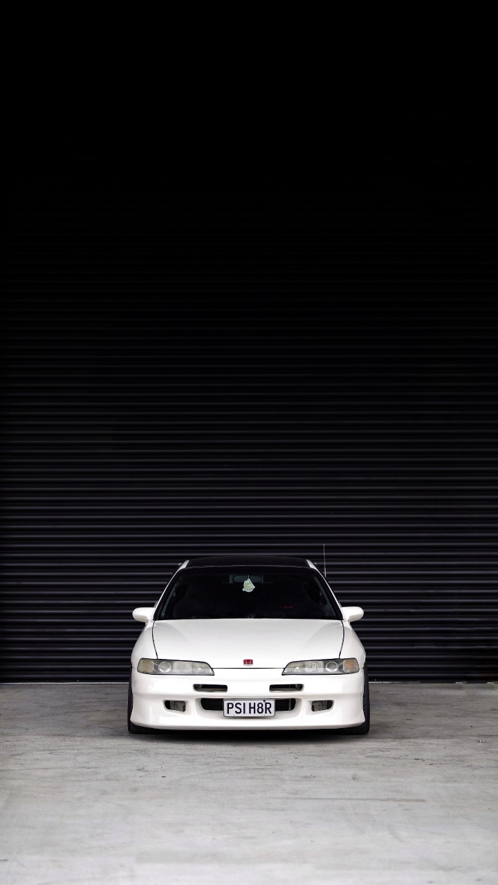 White Car in a White Room. Wallpaper in 720x1280 Resolution