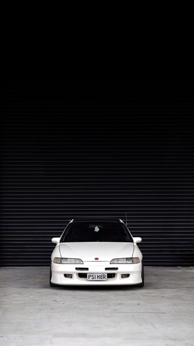 White Car in a White Room. Wallpaper in 750x1334 Resolution