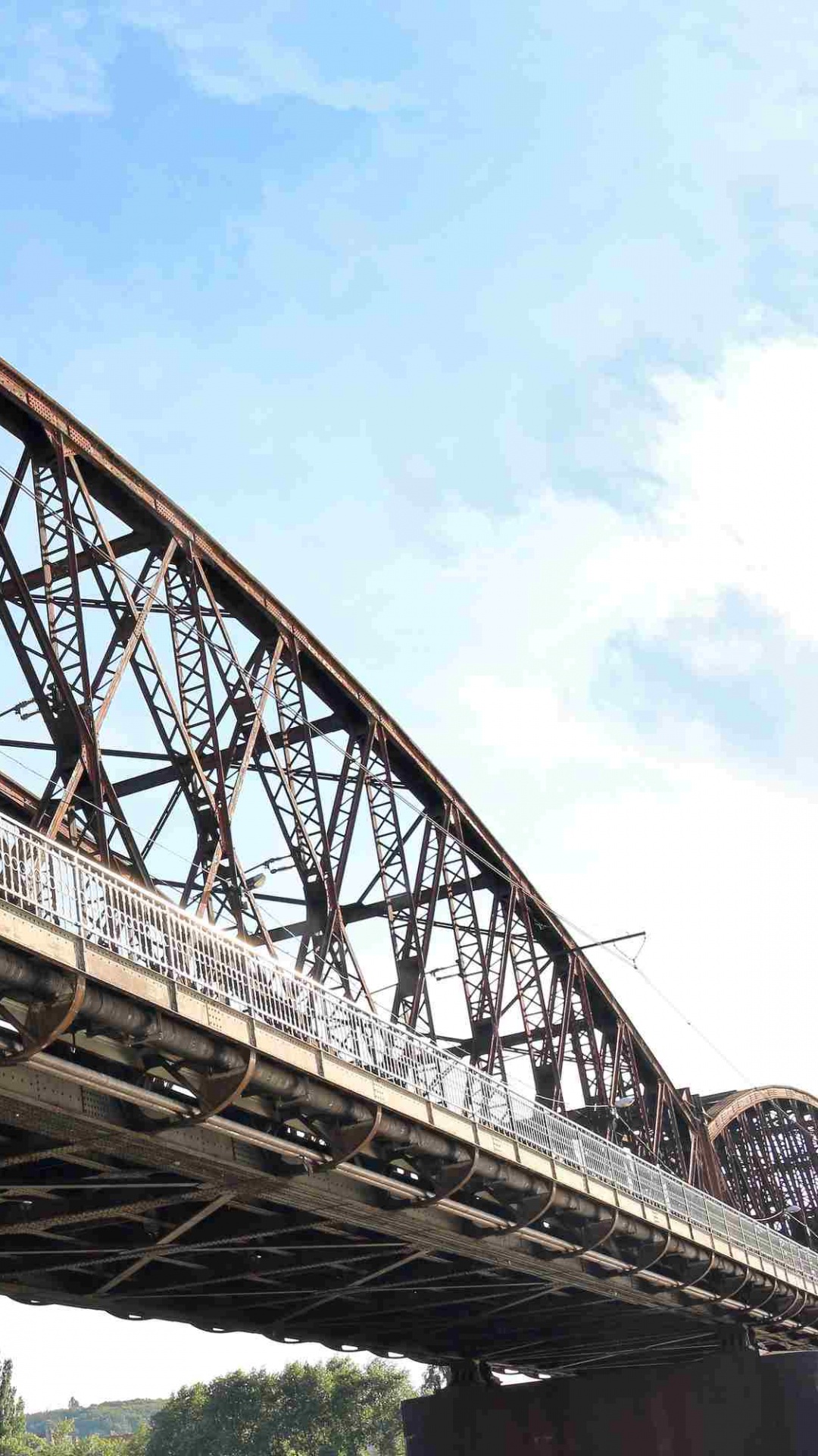 Brown Metal Bridge Under Blue Sky During Daytime. Wallpaper in 1080x1920 Resolution