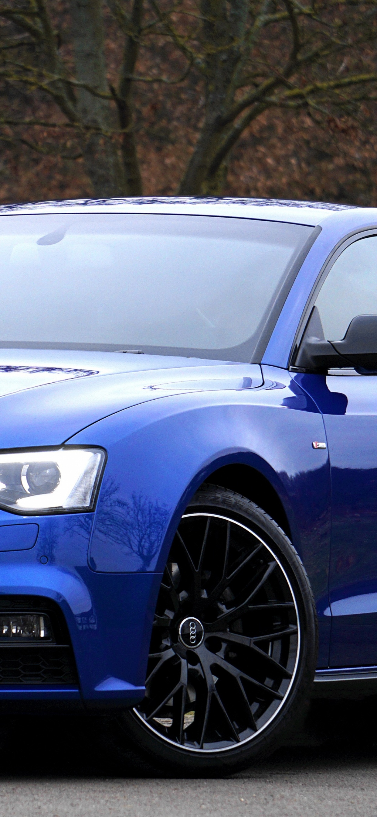 Blue Audi a 4 Coupe. Wallpaper in 1242x2688 Resolution