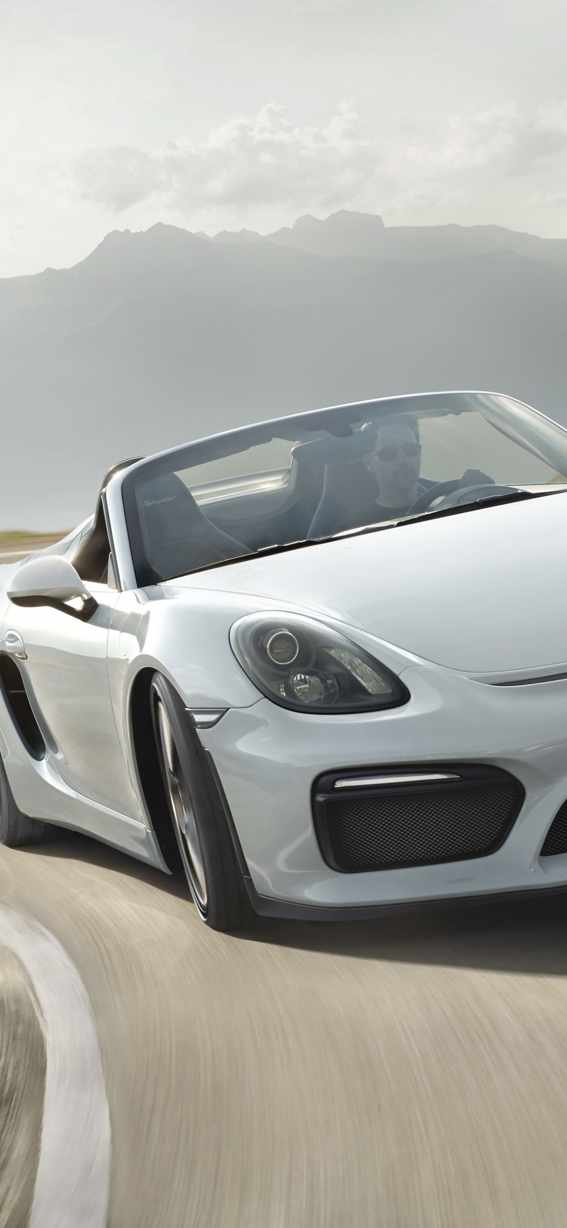 Weißer Porsche 911 Tagsüber Unterwegs. Wallpaper in 1125x2436 Resolution