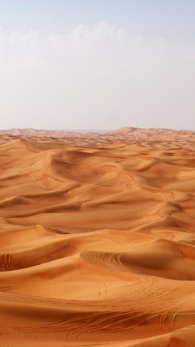 Desert Under Blue Sky During Daytime. Wallpaper in 750x1334 Resolution