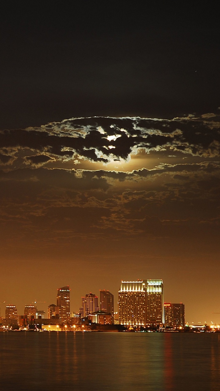 City Skyline During Night Time. Wallpaper in 720x1280 Resolution
