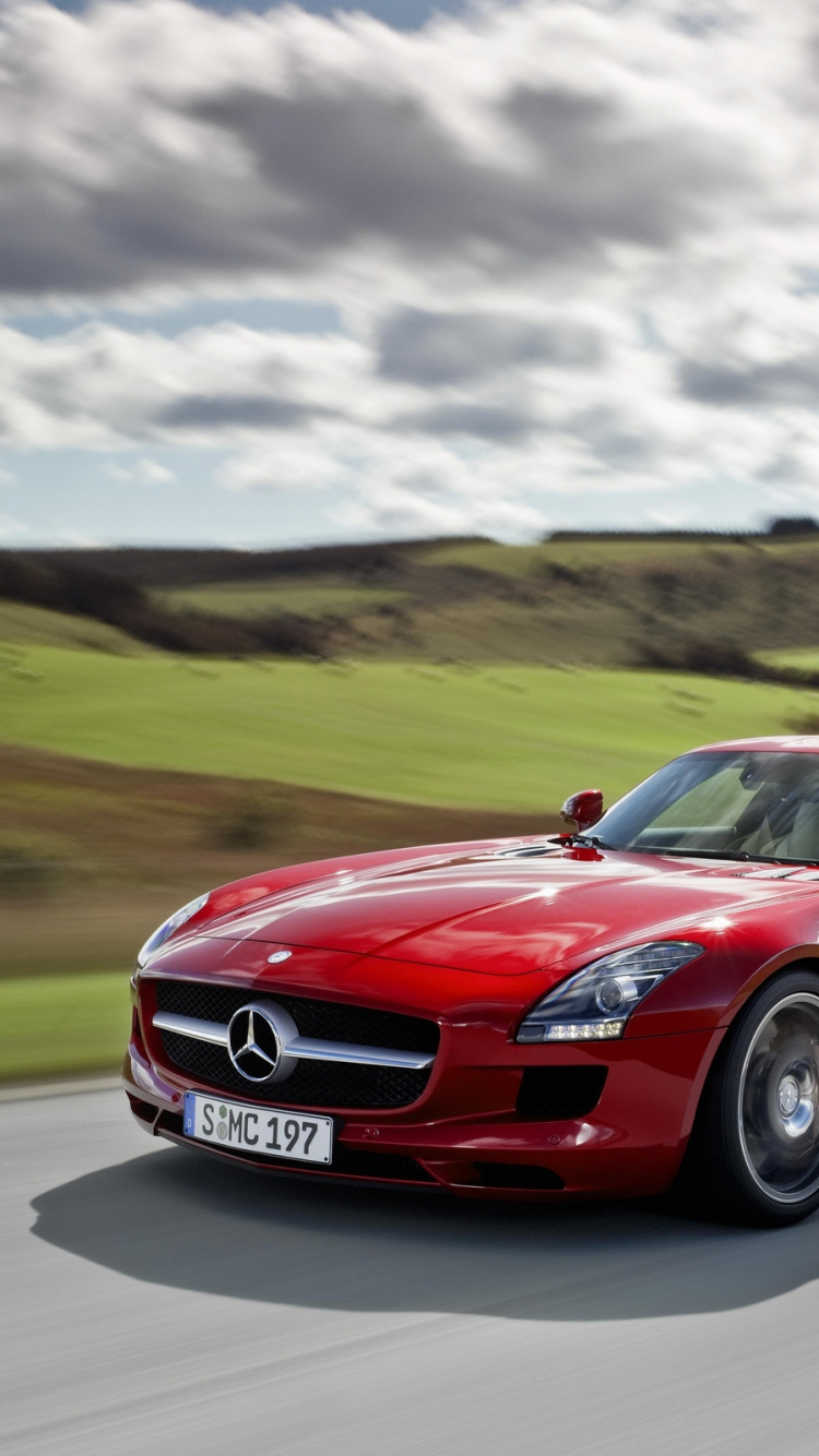 Red Chevrolet Camaro on Road During Daytime. Wallpaper in 750x1334 Resolution
