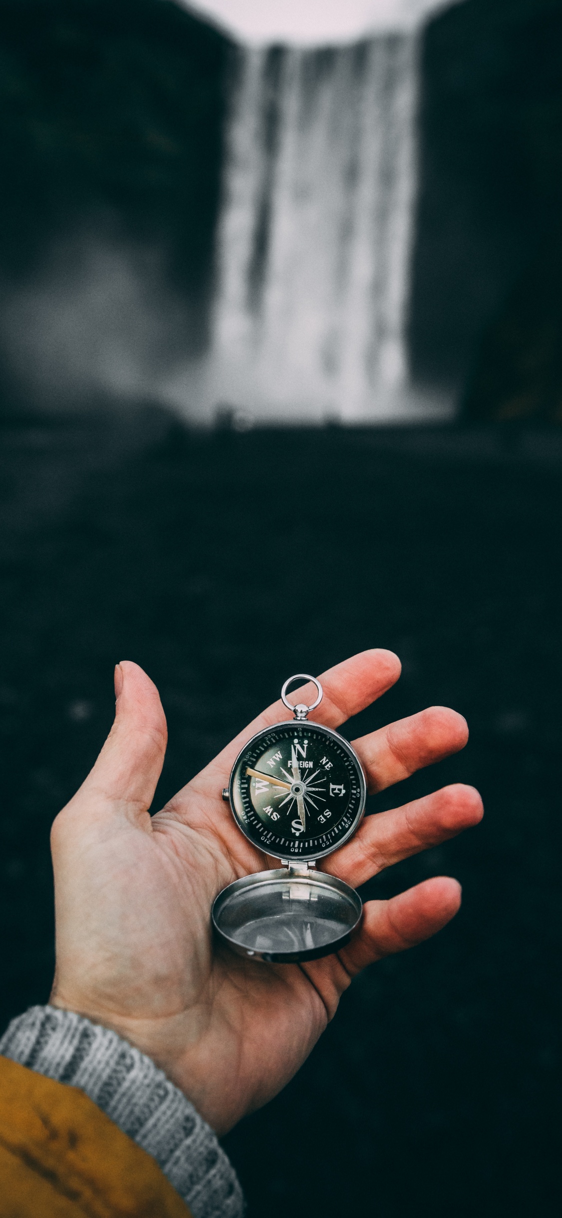 Person Holding Silver Round Analog Watch. Wallpaper in 1125x2436 Resolution