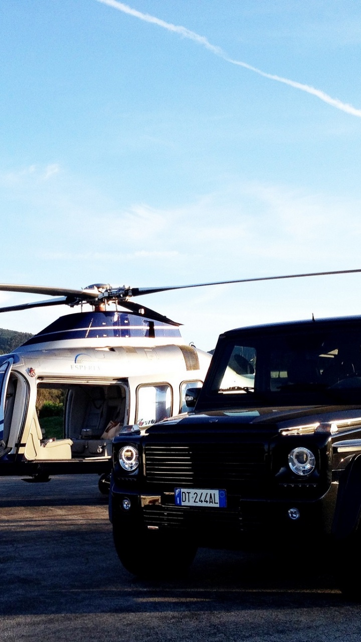 Jeep Wrangler Negro en la Carretera Durante el Día. Wallpaper in 720x1280 Resolution