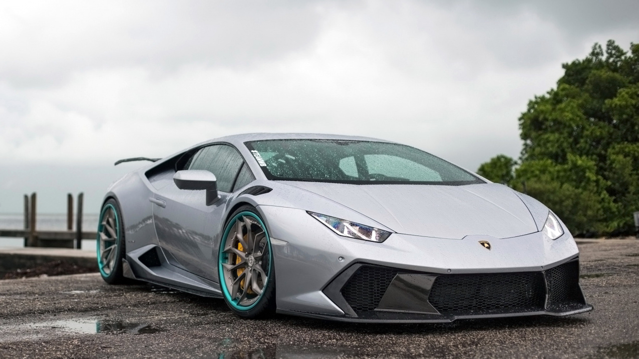 White Porsche 911 on Brown Field Under White Clouds During Daytime. Wallpaper in 1280x720 Resolution