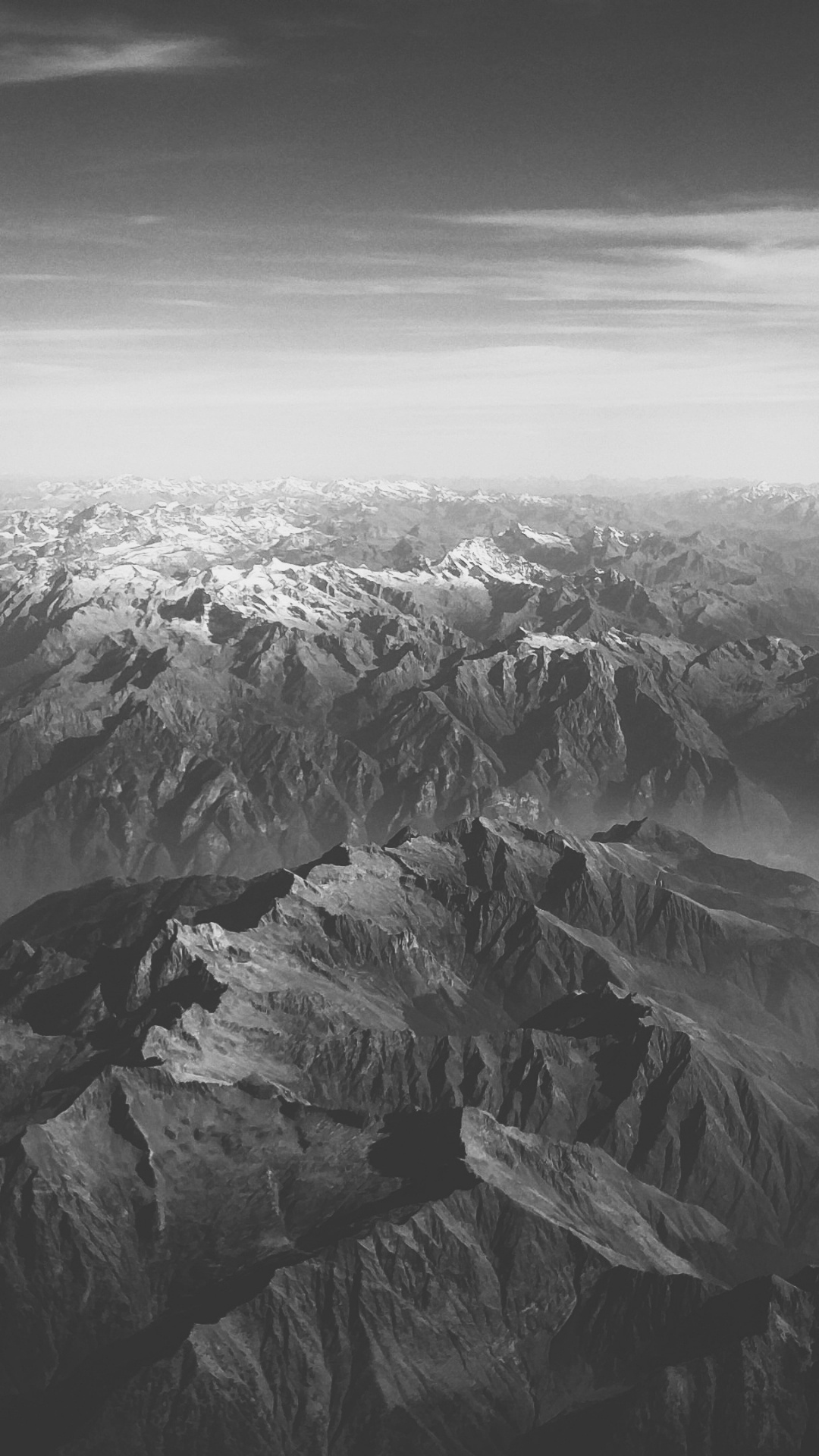 Grayscale Photo of Mountains Covered by Clouds. Wallpaper in 1080x1920 Resolution