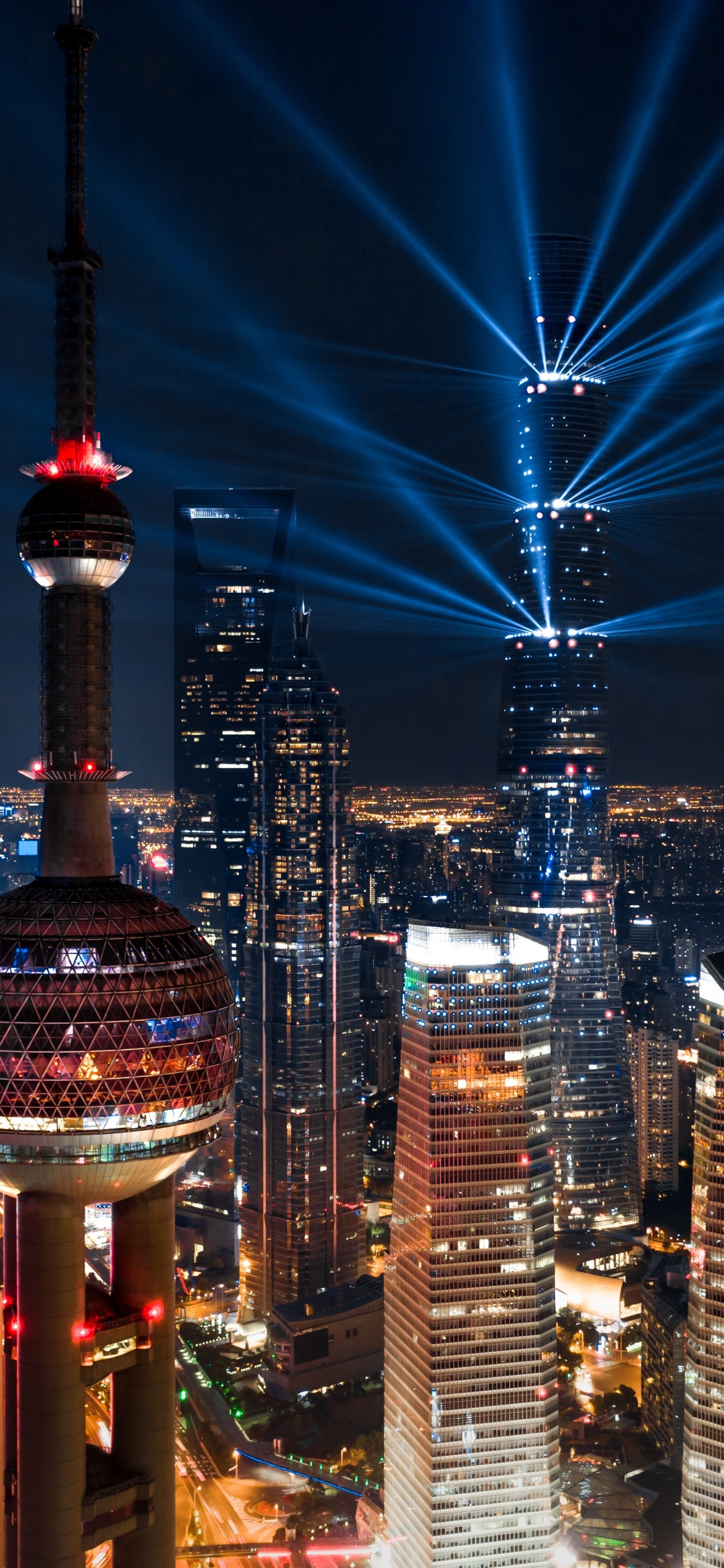 Stadtgebäude Während Der Nacht. Wallpaper in 1125x2436 Resolution