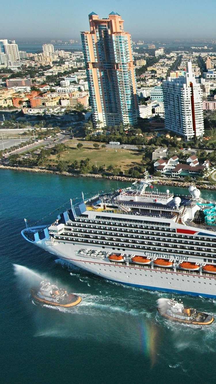 Bateau de Croisière Blanc et Bleu en Mer Pendant la Journée. Wallpaper in 750x1334 Resolution