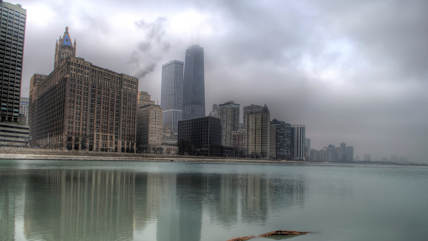 High Rise Buildings Near Body of Water During Daytime. Wallpaper in 1366x768 Resolution