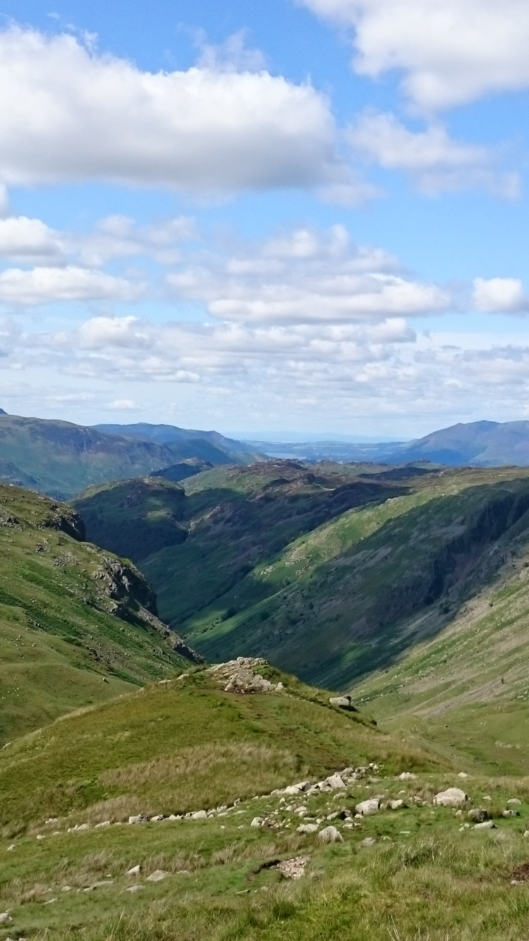 Green and Brown Mountains Under White Clouds and Blue Sky During Daytime. Wallpaper in 750x1334 Resolution