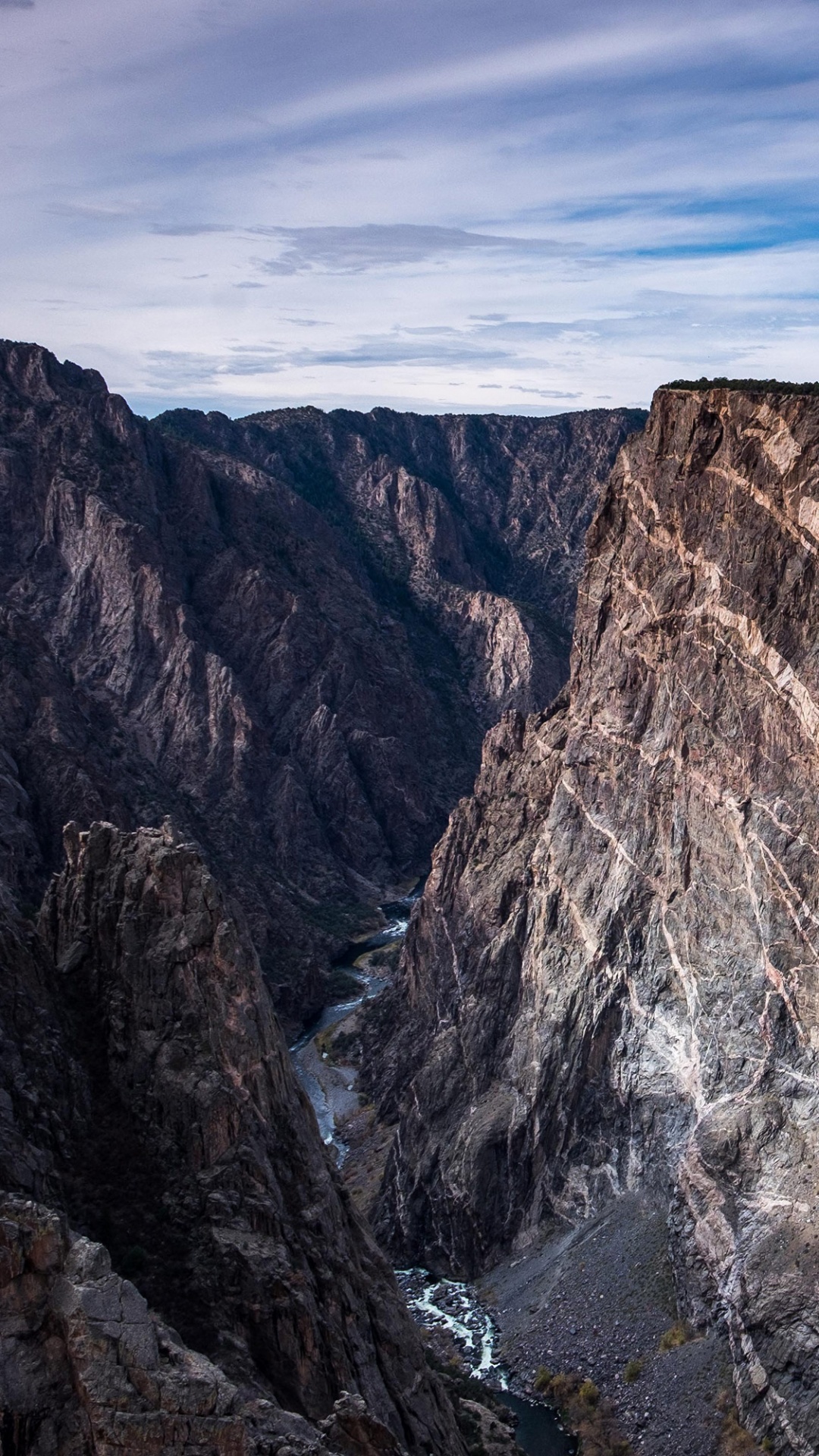 Brown Rocky Mountain Under Blue Sky During Daytime. Wallpaper in 1080x1920 Resolution