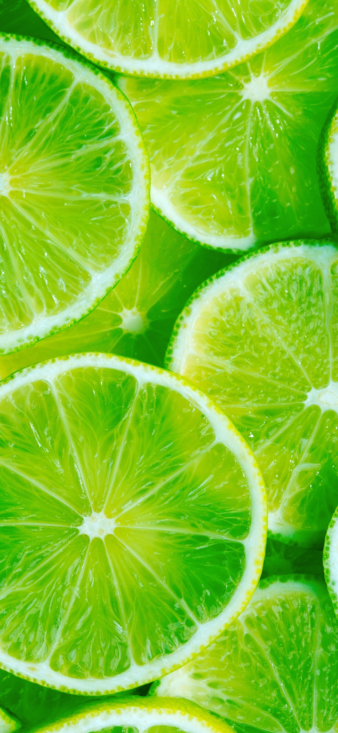 Grün-weiß Geschnittene Zitrusfrüchte. Wallpaper in 1125x2436 Resolution