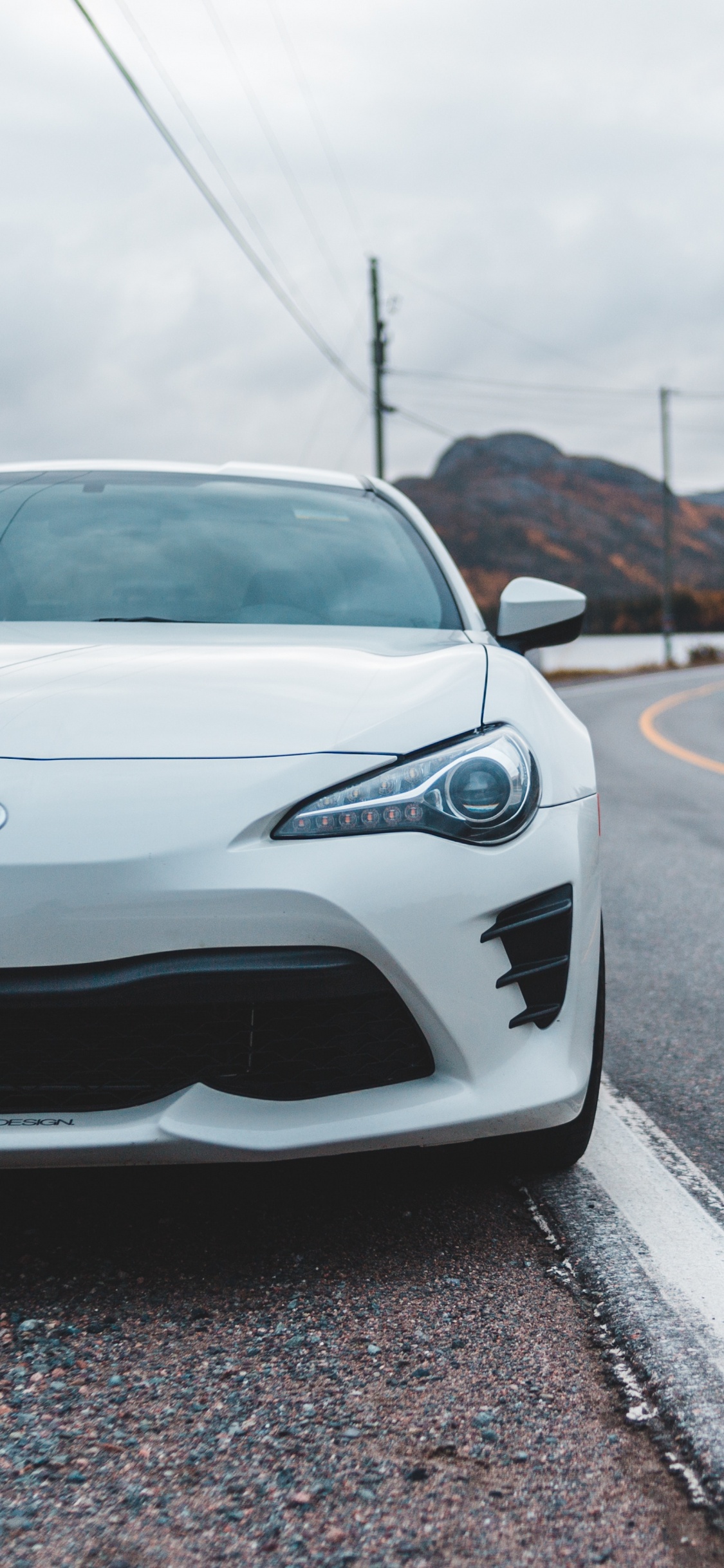 White Mercedes Benz c Class on Road During Daytime. Wallpaper in 1125x2436 Resolution