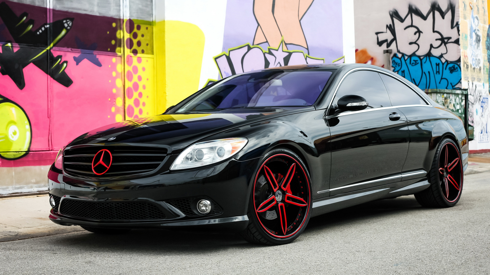 Black Mercedes Benz Coupe Parked Beside Yellow and White Painted Wall. Wallpaper in 1920x1080 Resolution