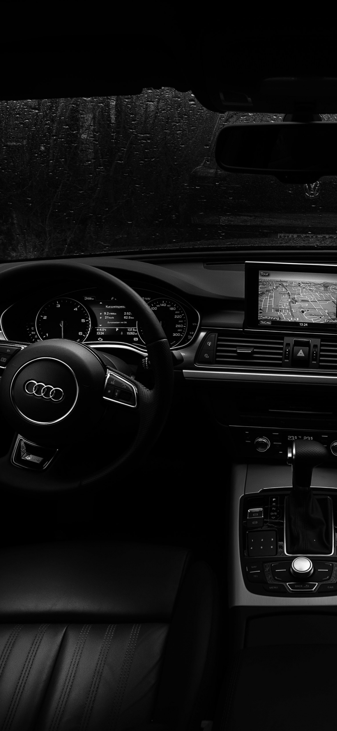 Intérieur de Voiture Noir et Gris. Wallpaper in 1125x2436 Resolution