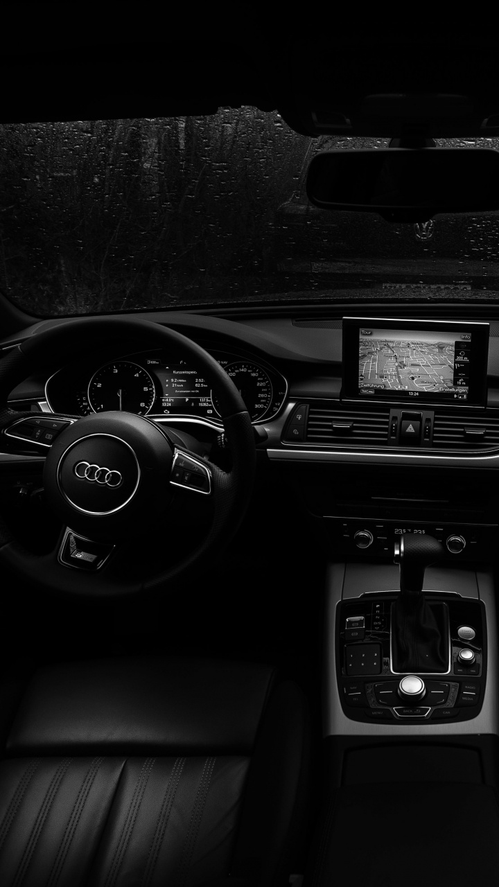 Intérieur de Voiture Noir et Gris. Wallpaper in 720x1280 Resolution