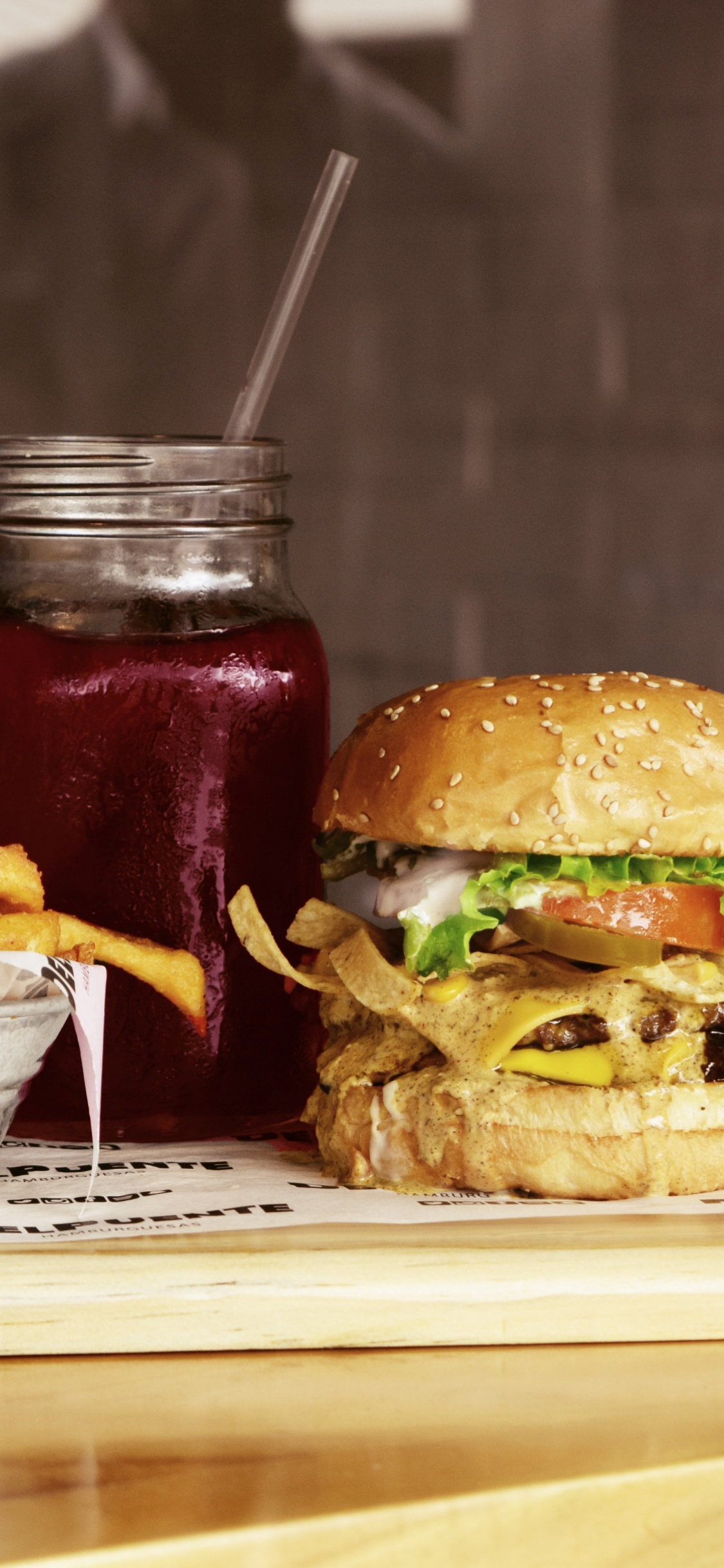 Burger and Fries on Brown Wooden Tray. Wallpaper in 1125x2436 Resolution