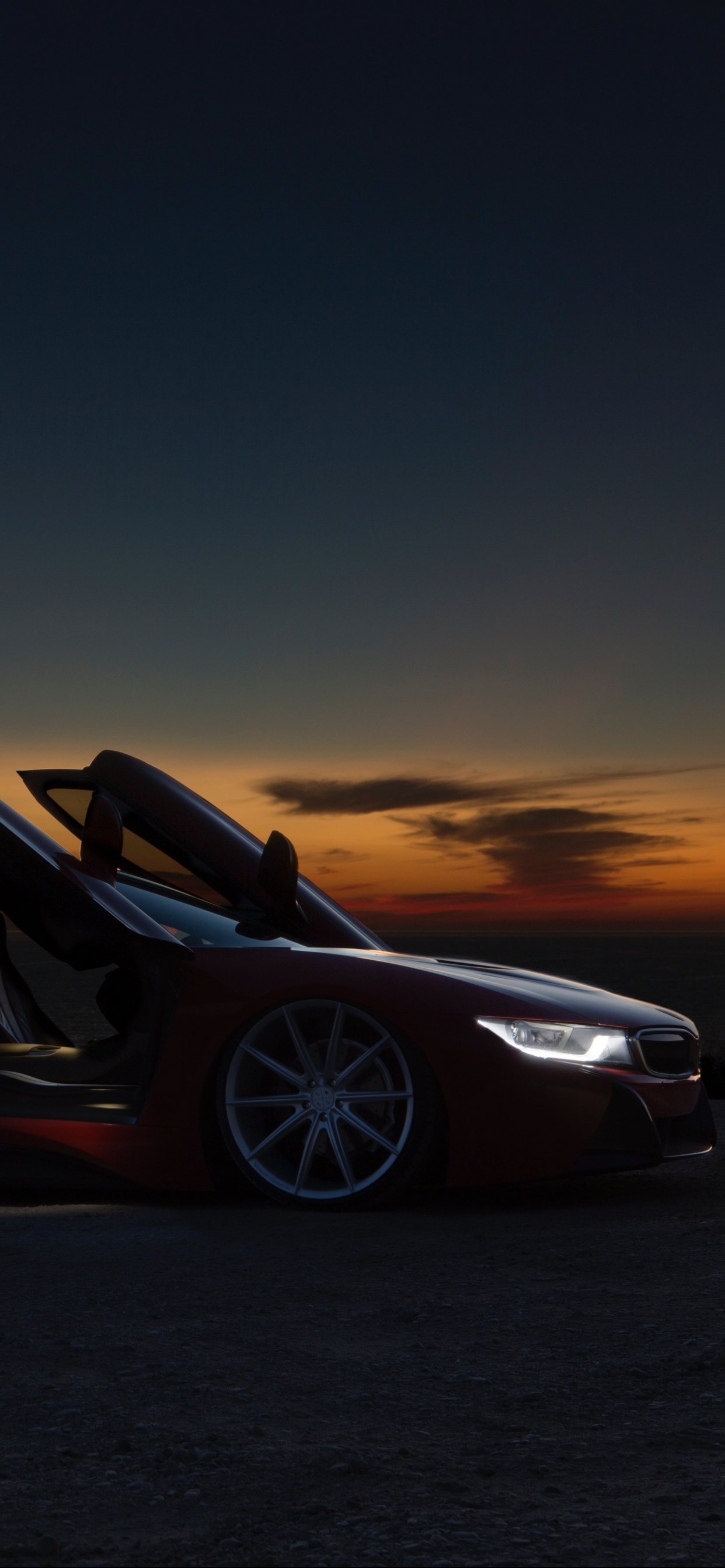 Ferrari 458 Italia Rojo en la Carretera Durante la Puesta de Sol. Wallpaper in 1242x2688 Resolution