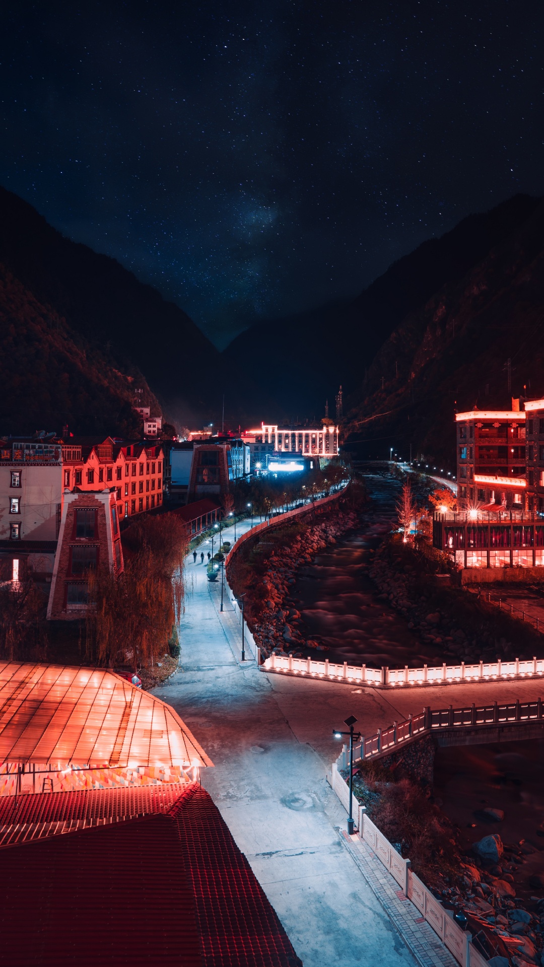 Red and White Concrete Building During Night Time. Wallpaper in 1080x1920 Resolution