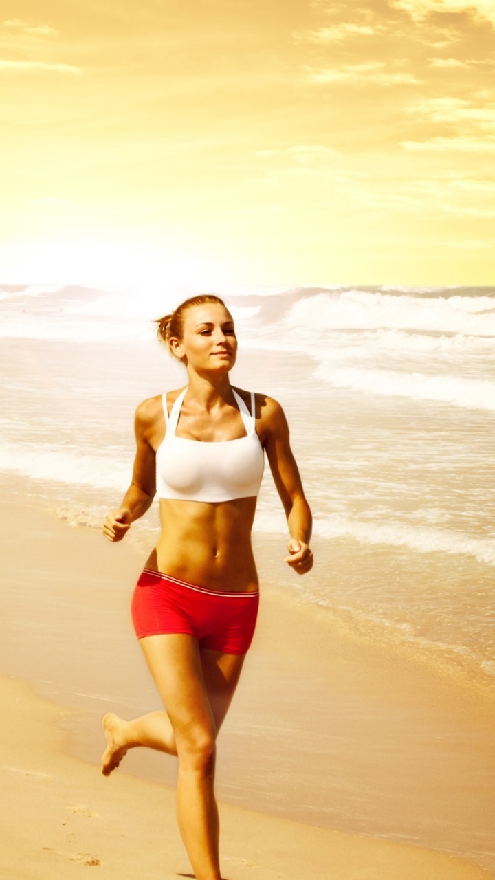 Meereswellen, Die Während Des Sonnenuntergangs an Land Krachen. Wallpaper in 720x1280 Resolution