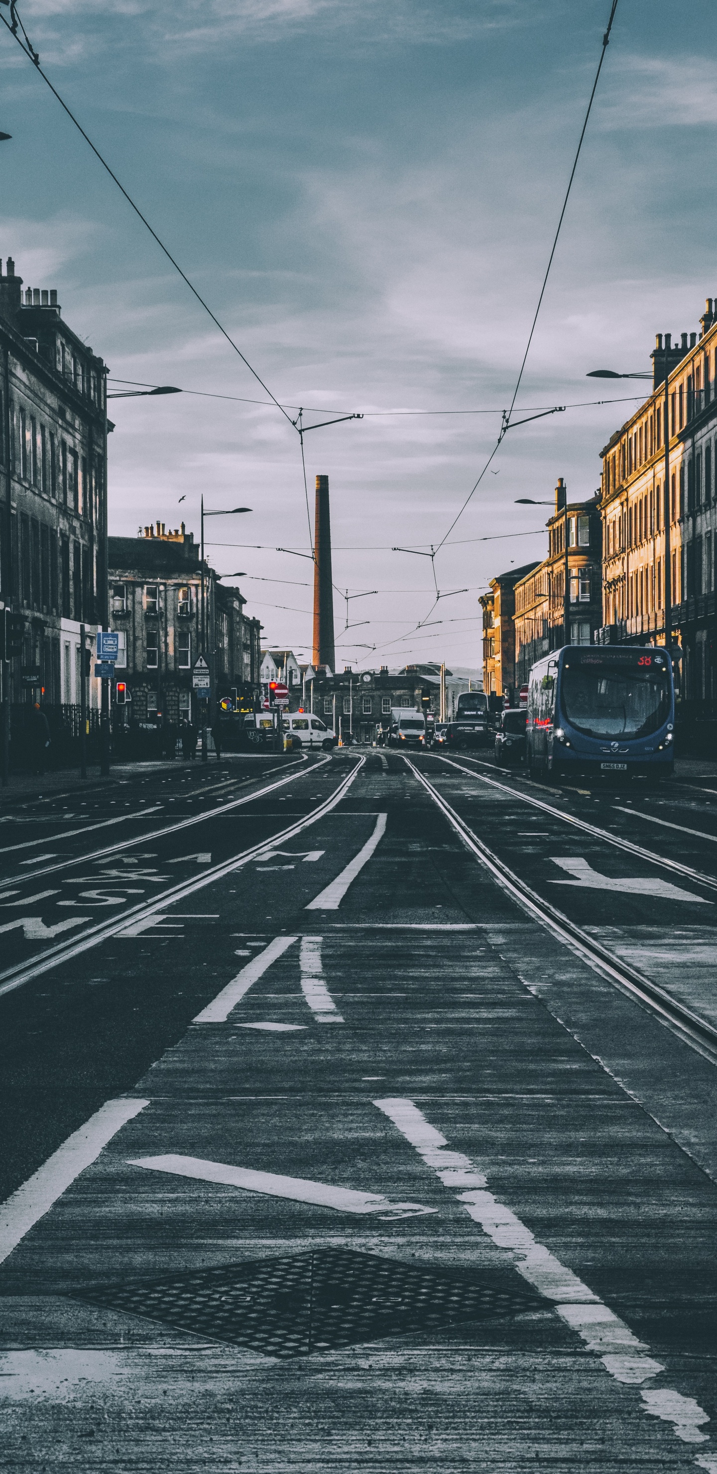 Cars on Road Between Buildings During Daytime. Wallpaper in 1440x2960 Resolution